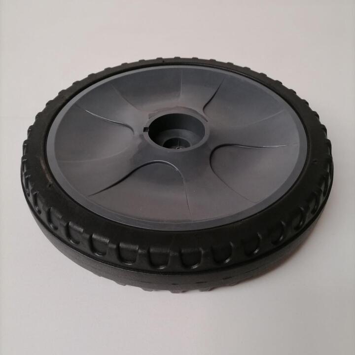 Rear wheel for floor sweeper