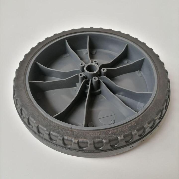 Rear wheel for floor sweeper