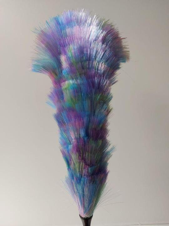 Duster with a black handle