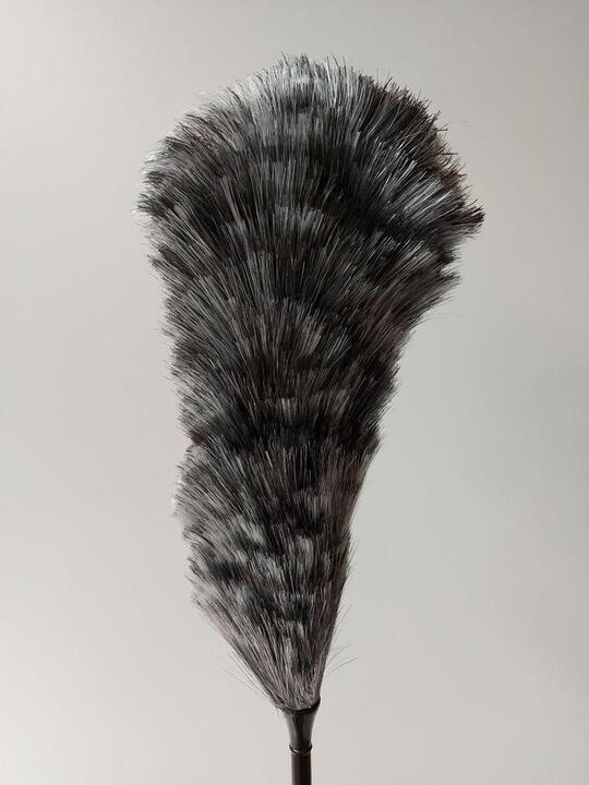 Duster with a black handle
